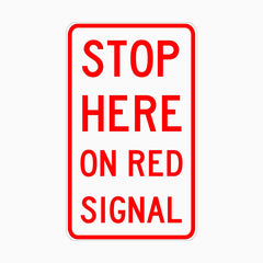 STOP HERE ON RED SIGNAL SIGN