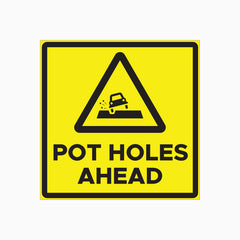 POT HOLES AHEAD SIGN