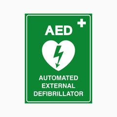 Green sign with AED (Automated External Defibrillator) symbol on a white background