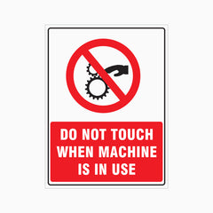 DO NOT TOUCH WHEN MACHINE IS IN USE SIGN