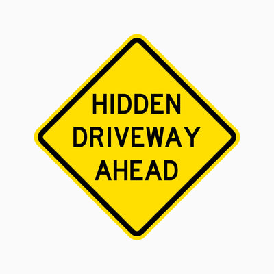 CAUTION HIDDEN DRIVEWAY AHEAD SIGN