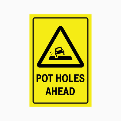 CAUTION POT HOLES AHEAD SIGN