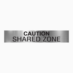 CAUTION - SHARED ZONE SIGN
