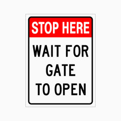 STOP HERE WAIT FOR GATE TO OPEN SIGN