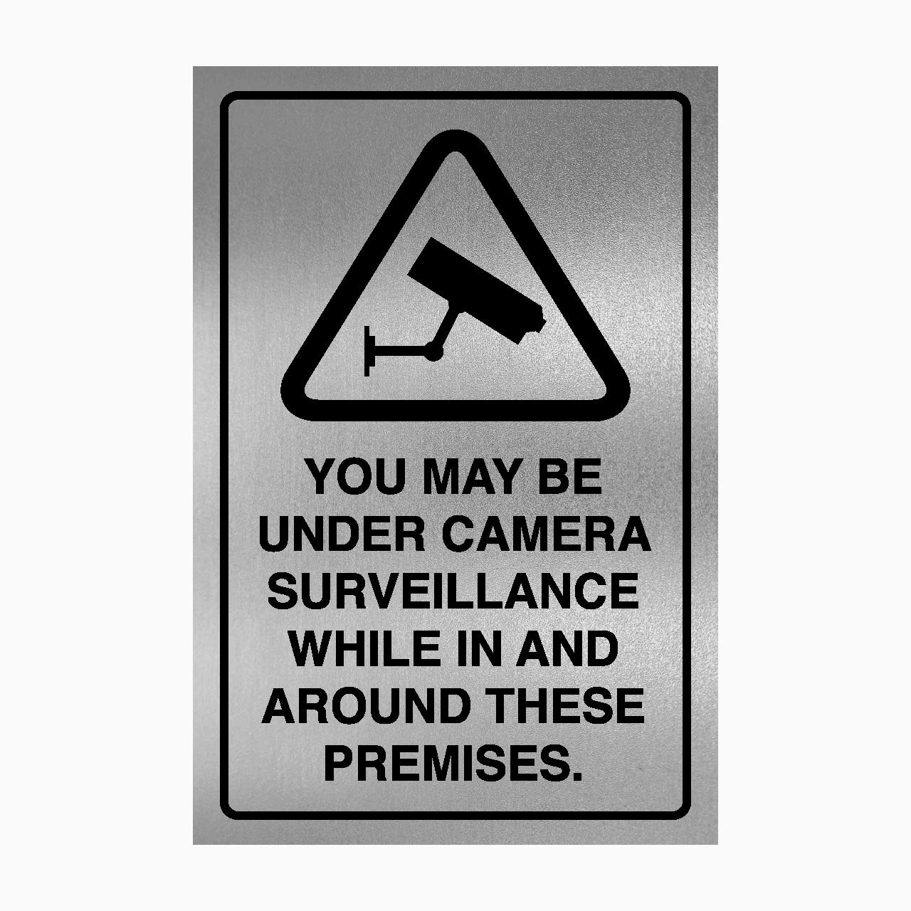 Surveillance warning sign with text on a silver background