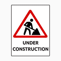 CAUTION UNDER CONSTRUCTION SIGN